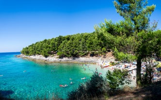 Photo of aerial view of town of Rovinj historic peninsula , famous tourist destination in Istria region of Croatia.