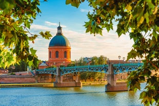 Photo of Toulouse and Garonne river aerial panoramic view, France.