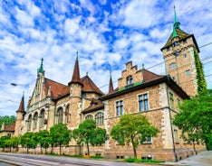 Panoramic view of historic Zurich city center with famous Fraumunster, Grossmunster and St. Peter and river Limmat at Lake Zurich on a sunny day with clouds in summer, Canton of Zurich, Switzerland