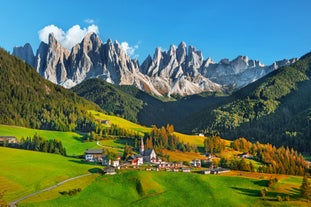 photo of skiing in the Alpe di Siusi with snow in winter, Dolomites, Italy.