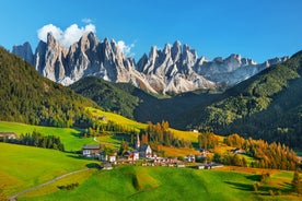 photo of the romantic, Snow covered Skiing Resort of Cortina d Ampezzo in the Italian Dolomites seen from Tofana with Col Druscie in the foreground.