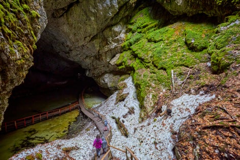Photo of Cave The glacier from Scarisoara - Romania. The Scărişoara cave or Scărişoara Glacier shelters the largest underground glacier in Romania.