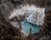 Beautiful cave interior water cavern with ancient stalactites and stalagmites