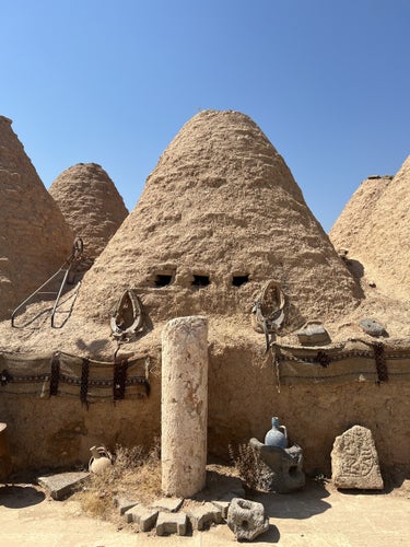 PHOTO OF VIEW OF HARRAN HOUSES made of mud one hundred and fifty two hundred years ago, Şanlıurfa, Turkey.