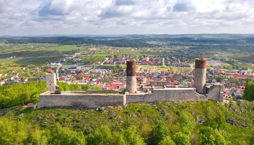 photo of aerial drone view, scenic summer evening landscape of Chęciny Castle (Kielce County, Świętokrzyskie Voivodeship) in Poland.