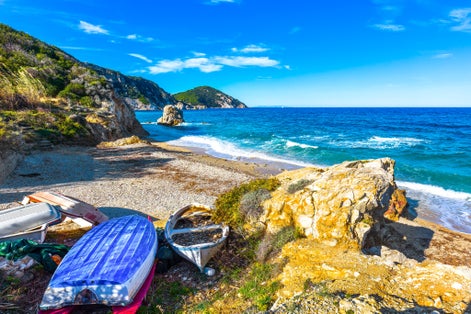 Elba island, Portoferraio Sansone la Sorgente beach coast and old boats. Tuscany, Italy, Europe. Long Exposure.