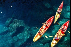 Kayak et plongée en apnée au coucher du soleil avec collation de fruits, eau et vin