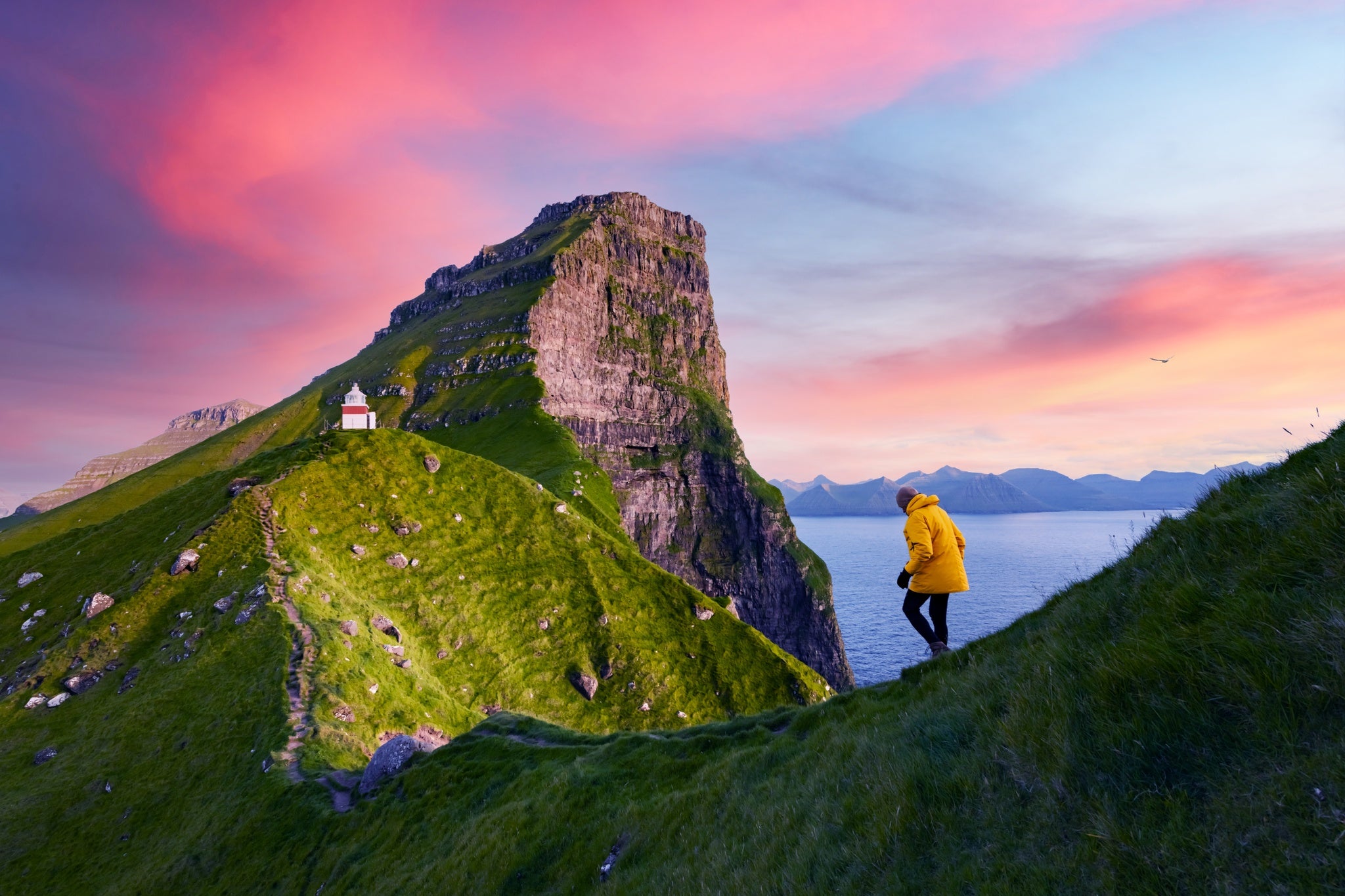 Kallur lighthouse on green hills of Kalsoy island, Faroe islands, Denmark.jpg