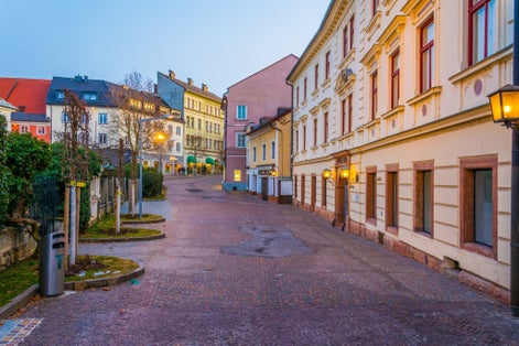 view of a narrow street in the austrian city villach