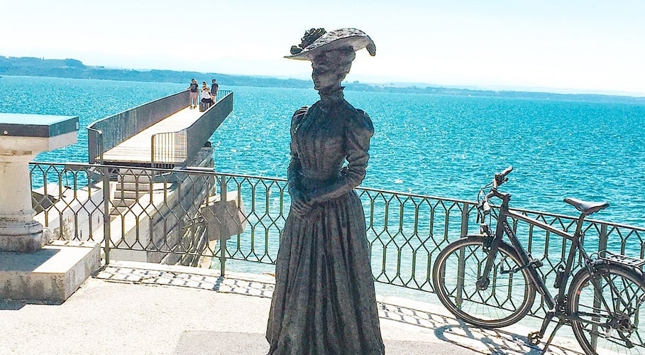 NEUCHATEL, SWITZERLAND,Statue of a gentleman and a lady in Neuchatel, Switzerland