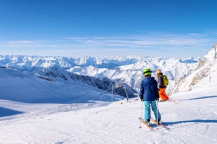 Photo of panorama of Hintertux ski resort in Zillertal Alps in Austria with the far view of ski lifts and pistes.