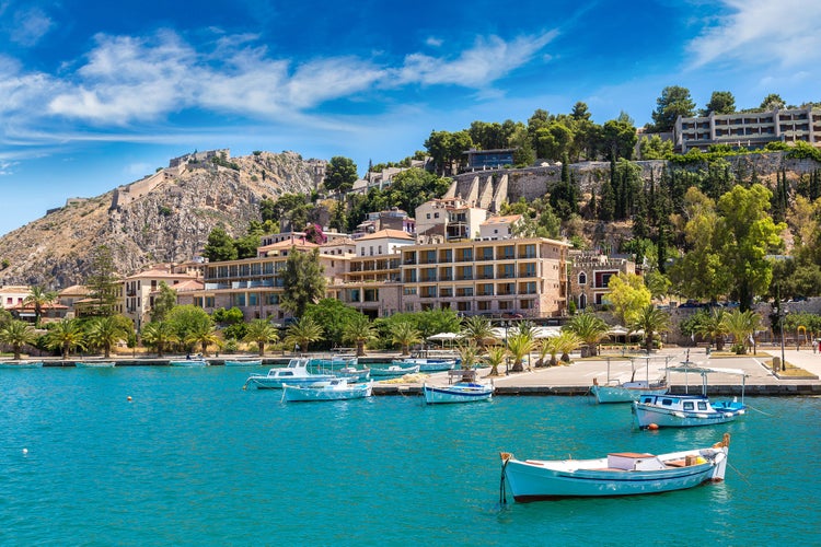 Photo of Greece, Nafplio in a beautiful summer day with white fishing boats.