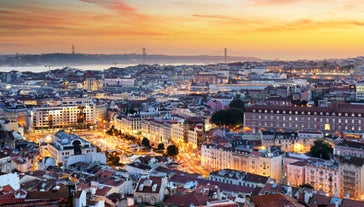 Photo of Lisbon City Skyline with Sao Jorge Castle and the Tagus River, Portugal.