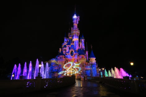 Photo of Disneyland Paris at night, France.