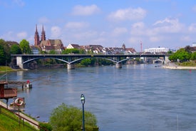 View of the Old Town of Basel with red stone Munster cathedral and the Rhine river, Switzerland.