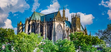 Photo of Metz city view of Petit Saulcy an Temple Neuf and Moselle River in Summer, France.