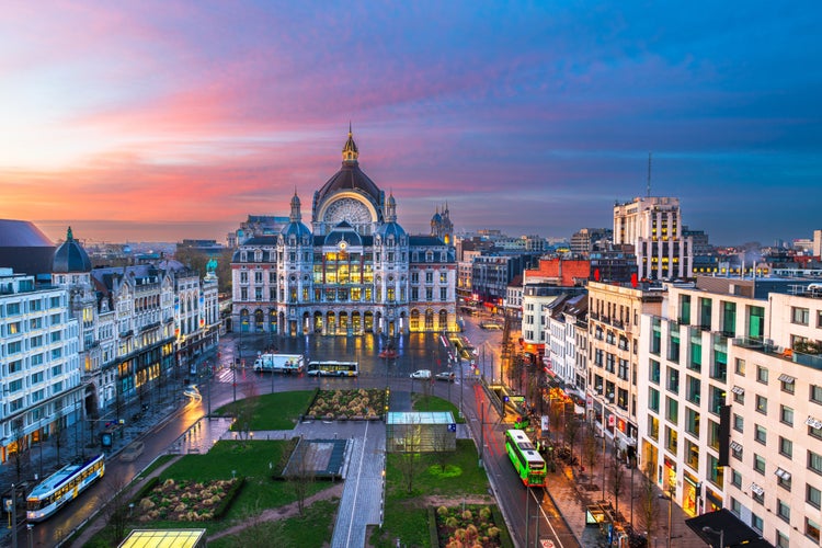 Antwerp, Belgium cityscape and plaza at dawn.