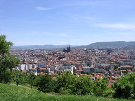 Photo of panoramic view of the city of Clermont-Ferrand with its cathedral, France.