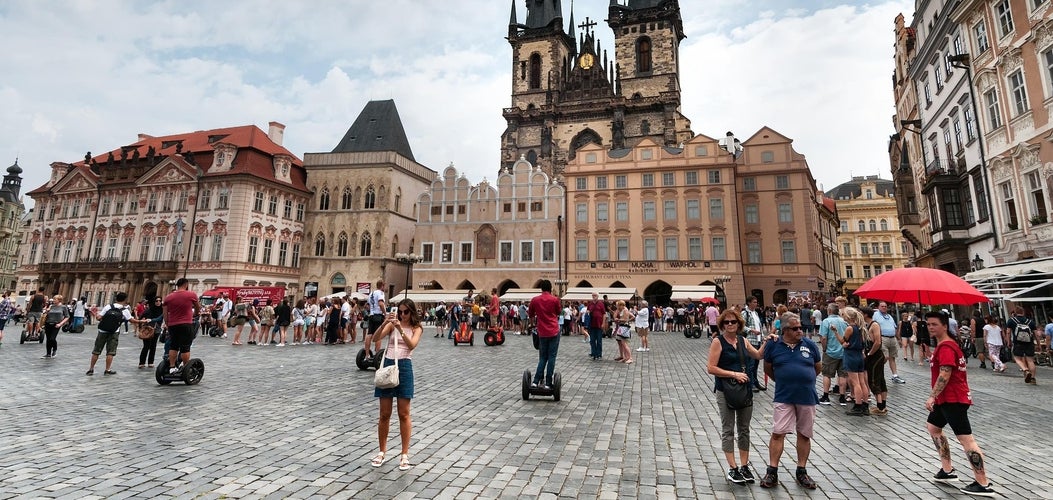 Summer crowds in Prague’s Old Town Square, illustrating peak travel season in Czechia in July..jpg