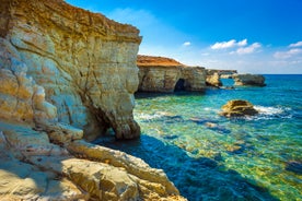 Photo of aerial view on clear blue water of Coral bay in Peyia, Cyprus.