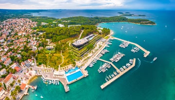 Photo of aerial view of town of Rovinj historic peninsula , famous tourist destination in Istria region of Croatia.