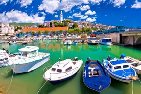 Photo of aerial view of Historic Adriatic town of Krk aerial view, Island of Krk, Kvarner bay of Croatia.