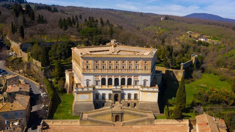 Aerial view of the Villa Farnese, a pentagonal mansion in Caprarola, near Viterbo, Italy. It is a massive Renaissance and Mannerist construction. It is built on a five-sided plan in reddish gold stone