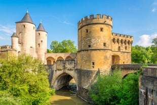 Photo of Metz city view of Petit Saulcy an Temple Neuf and Moselle River in Summer, France.