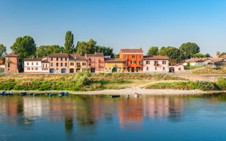 Photo of aerial view of Pavia and the Ticino, Cathedral of Pavia and Covered Bridge, Italy.