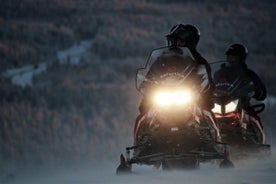 Evening Escape - Snowmobile safari and campfire in Rovaniemi