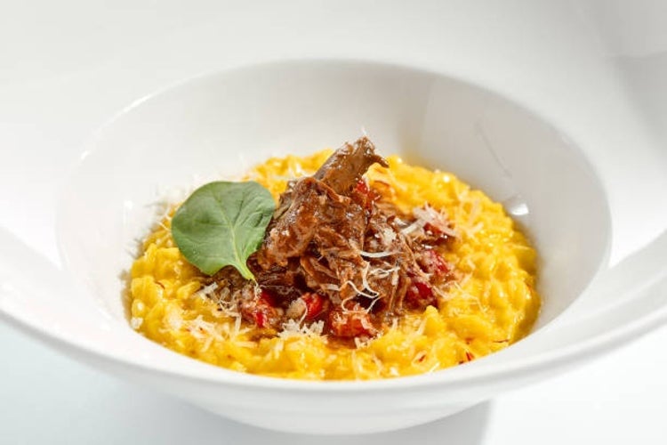 Risotto alla Milanese served with a rich meat ragu.jpg