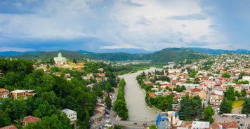 Photo of aerial view of the mining town Chiatura famous for its manganese mines being situated on Kvirila river, Typical soviet architecture, Georgia.