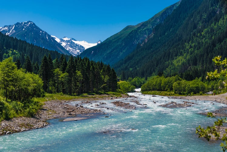 photo of natural creek landscape with view to the glacier in Neustift the Stubai valley, Tyrol, Austria.