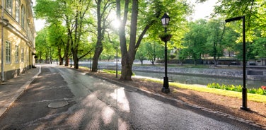 Early autumn morning panorama of the Port of Turku, Finland, with Turku Castle at background.