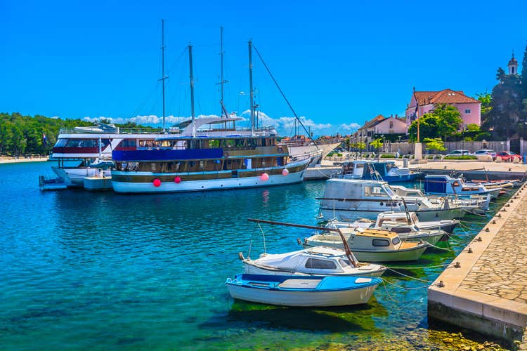 Scenic view at marble marina in Starigrad ancient roman town, Hvar island tourist resort. / Selective focus.