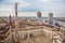 photo of Milan, Italy panorama. View from Milan Cathedral. Royal Palace of Milan - Palazzo Realle and Velasca Tower in the background.