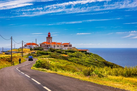 Photo of the lighthouse in Cabo da Roca on a beautiful summer day, Portugal.