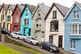  Cork, Ireland. Fishing boats inside the port of Cobh. A city with colorful houses in Ireland.