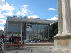 Photo of Nimes Arena aerial panoramic view. Nimes is a city in the Occitanie region of southern France.