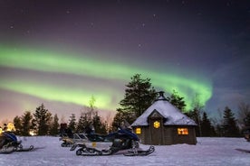 Levi Northern lights by snowmobile