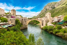 Photo of aerial view of the old bridge and river in city of Mostar, Bosnia and Herzegovina.