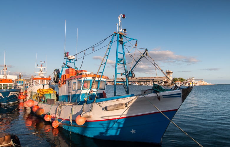 Photo of View of traditional fishing boats on the port of Olhao, Portugal.