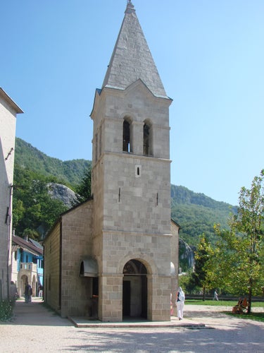 photo of view of Monastic Compound, Lower Ostrog and the Church of the Holy Trinity. Danilovgrad. Montenegro.