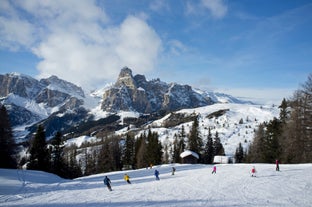photo of Autumn morning panoramic shot on Stern-La Villa from San Cassiano, Piz la Ila, Gruppo Sella, Sassongher, Piza de Gherdenacia, Peitlerkofel in Italy.