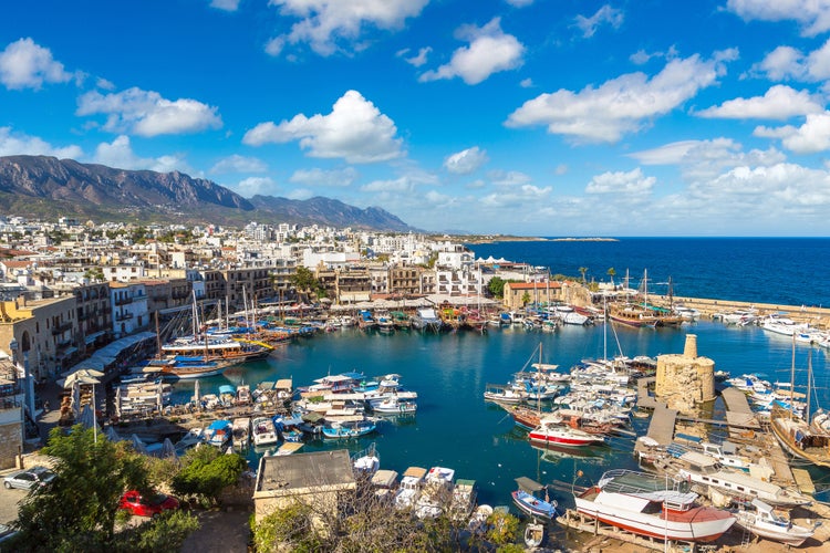 pHOTO OF Panoramic aerial view of historic harbour in Kyrenia (Girne), North Cyprus in a beautiful summer day.