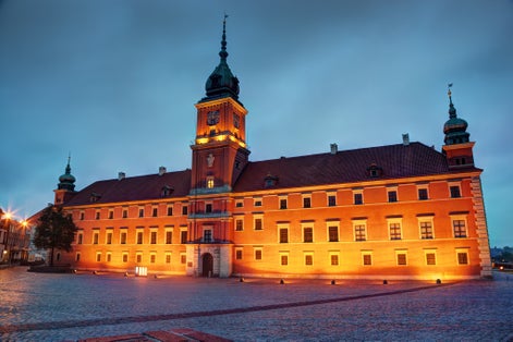 Photo of Royal Castle in the old town of Warsaw, Poland at the evening..