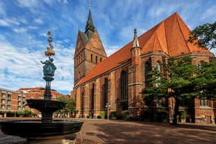 Photo of panorama of New City Hall in Hannover in a beautiful summer day, Germany.