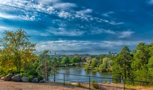 Early autumn morning panorama of the Port of Turku, Finland, with Turku Castle at background.