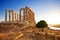 Photo of ruins of an ancient Greek temple of Poseidon before sunset, Greece.