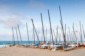 Photo of Sand beach and historical Old Town in mediterranean resort Sitges near Barcelona, Costa Dorada, Catalonia, Spain.